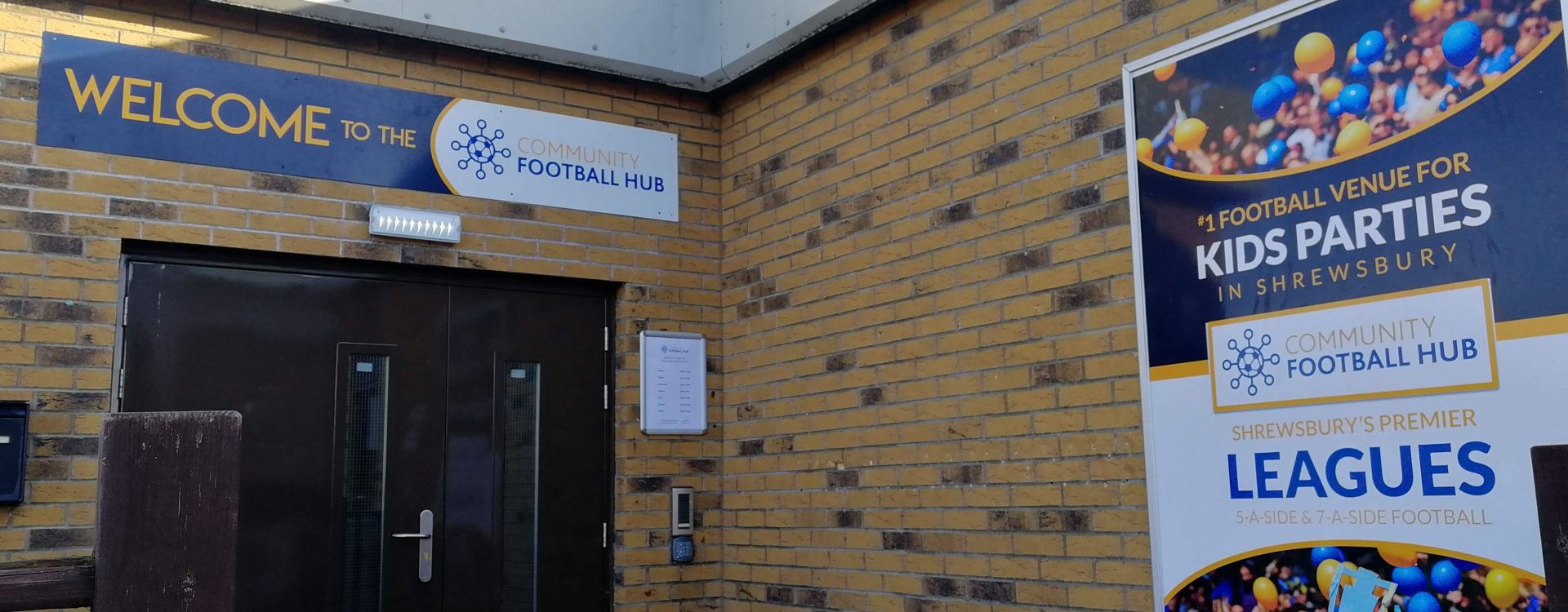 Signage above entrance at Community Football hub